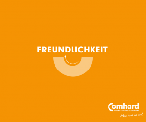 Das Wort Freundlichkeit auf orangenem Hintergrund